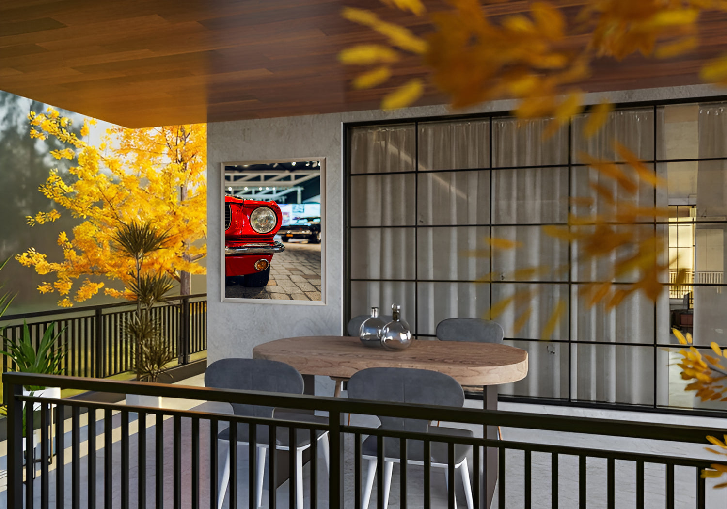 Gerahmtes Wandbild mit rotem Mustang hängt an einer Haus-Außenwand, mit Blick auf eine bedachte Terrasse.